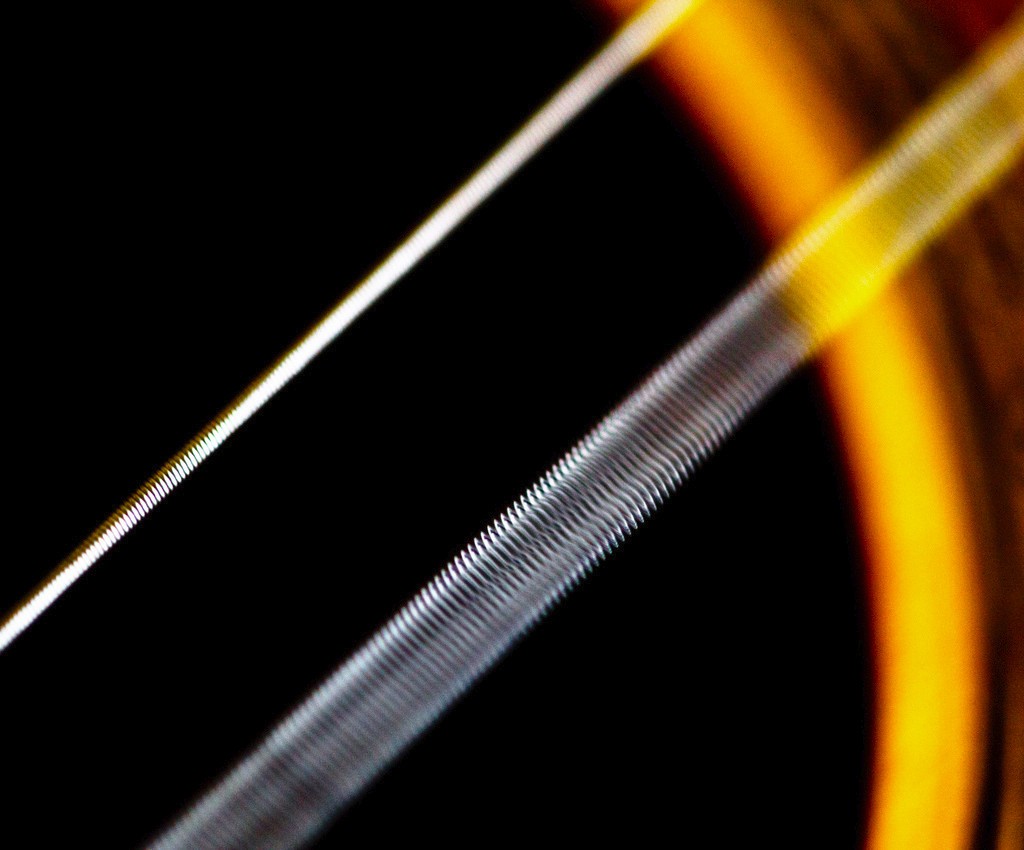 "Vibrating guitar string" by jar [0] is licensed under CC BY 2.0